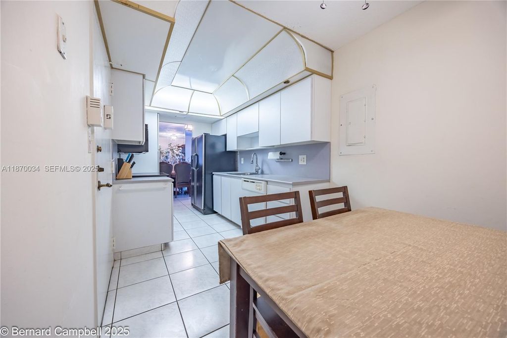 Photo of 1100 Saint Charles Pl #717, Pembroke Pines, FL 33026 (MLS # A11870034)