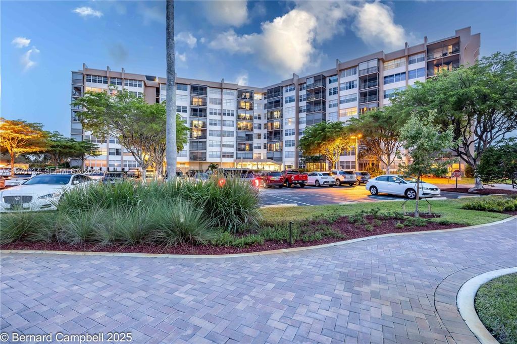 Photo of 1100 Saint Charles Pl #717, Pembroke Pines, FL 33026 (MLS # A11870034)