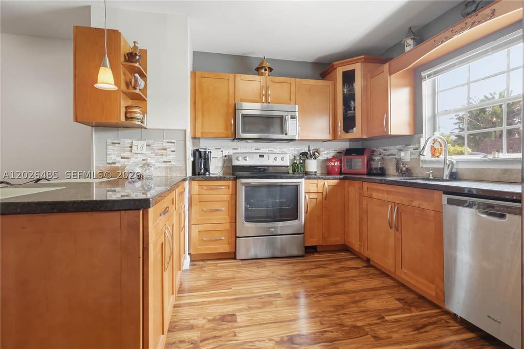 Photo of 2321 SW 81st Ter #5, North Lauderdale, FL 33068 (MLS # A12026485)