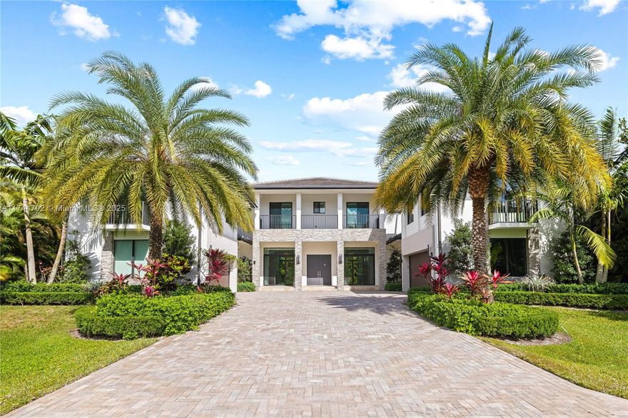 Welcome to the epitome of luxury in Plantation Acres with all the finest finishes & it's own private quiet cul-de-sac! This stunning 7000 SQFT estate features 7 bedrooms, 7.5 bathrooms + an office, loft & bonus room ready to be your gym, theater or private get-a-way.The Kosher-compliant kitchen includes two refrigerators, 2 sinks, 2 dishwashers & a gas stove. Volume ceilings, en-suite bathrooms in each bedroom, smart home, electronic curtains, & three wet bar areas add to the luxury. Enjoy outdoor living all year around w/ a mosquito mist-protected veranda, XL lap pool, & gorgeous summer kitchen. With your 4-car garage & 10+ car driveway to complete this exceptional estate—just minutes from A rated schools including American Heritage, shopping & dining! Connect anytime for a private tour!