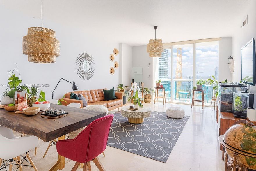 Stunning views in this rare 4016 unit at Brickell on the River North. This home features floor-to-ceiling impact windows, an open layout, high ceiling, and two private balconies overlooking the Miami River and city skyline. Residents enjoy resort-style amenities including a full fitness center, spa/steam rooms, club room, concierge, and direct access to the Riverwalk and Metromover station. Just steps from Brickell City Centre, restaurants and nightlife, this is a perfect blend of luxury, location, and lifestyle.