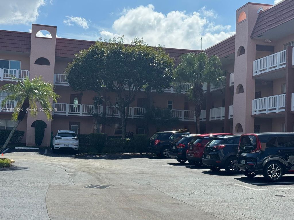 Photo of 9420 Sunrise Lakes Blvd #105, Sunrise, FL 33322 (MLS # A11969933)