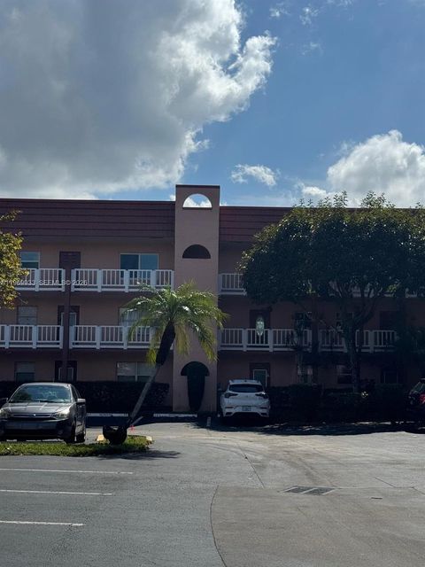 Photo of 9420 Sunrise Lakes Blvd #105, Sunrise, FL 33322 (MLS # A11969933)