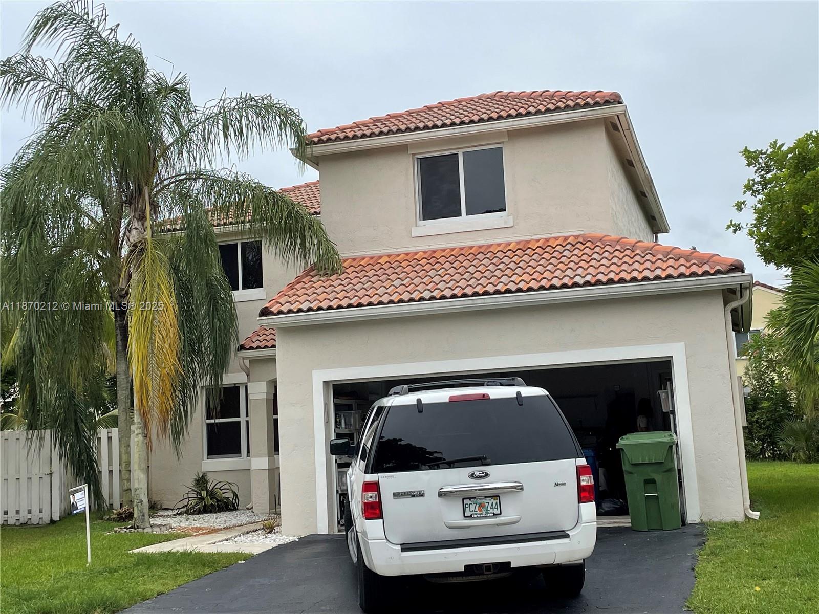Amazing Home located in the gated community THE FALLS in a Cul de Sac, offering a perfect blend of comfort and lifestyle. House comes with impact windows all throughout and has lots of natural light. Open kitchen concept with nice entertainment area. Featuring 4 Bedrooms Upstairs with remodeled bathrooms, the layout provides privacy and a great family-friendly design. Master Bedroom has a very nice size with walking closet accordingly.
