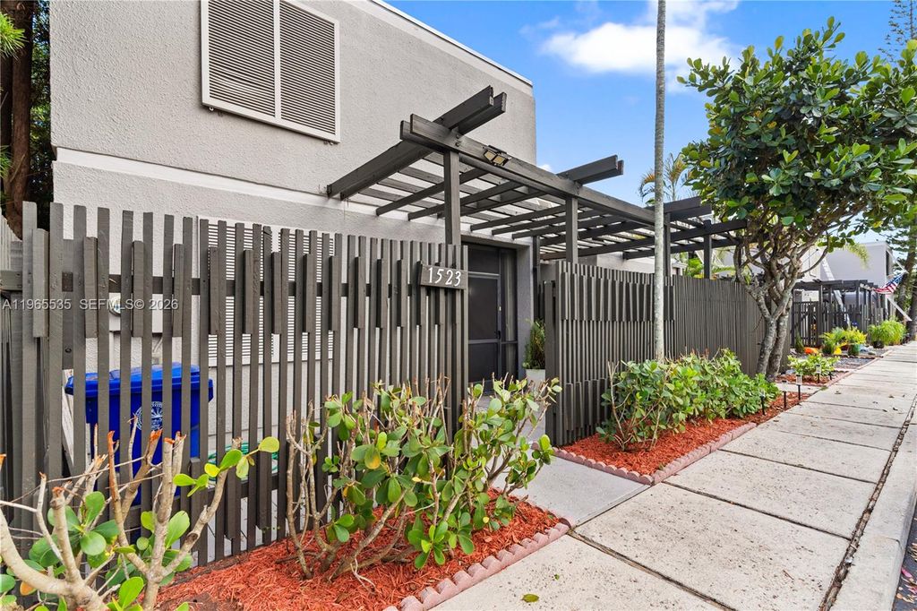 Photo of 1523 NW 113th Way, Pembroke Pines, FL 33026 (MLS # A11965535)