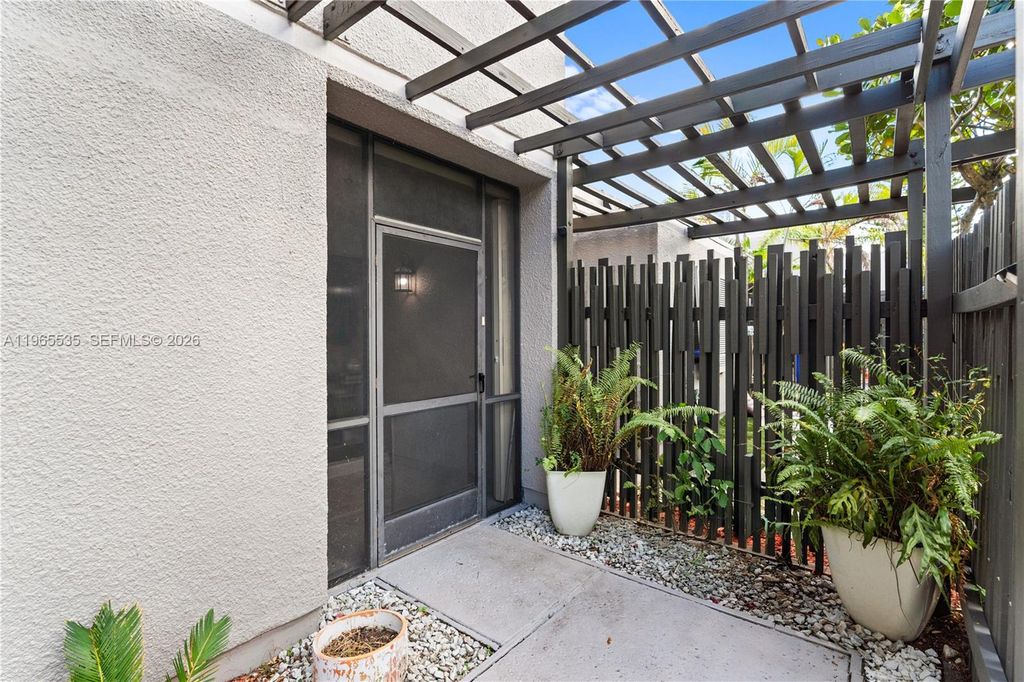 Photo of 1523 NW 113th Way, Pembroke Pines, FL 33026 (MLS # A11965535)