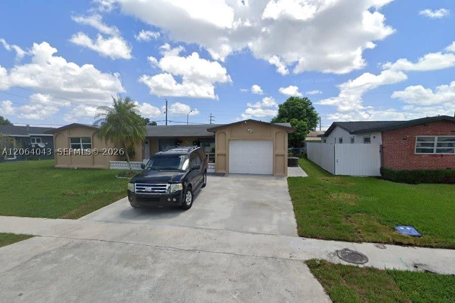 Photo of 711 SW 64th Pkwy #711, Pembroke Pines, FL 33023 (MLS # A12064043)