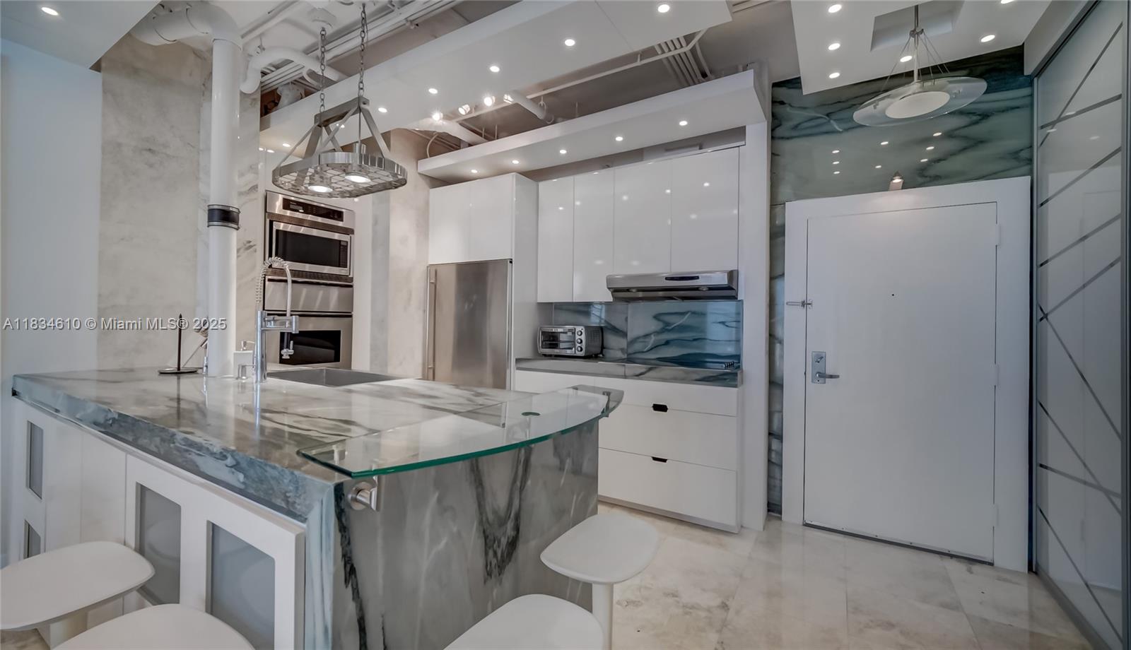 Experience elevated living in this spacious penthouse located at The Mark. This beautiful residence offers breathtaking panoramic views of Biscayne Bay and the Miami skyline. 2 bedrooms and 2 bathrooms, this bright and open floor plan includes floor-to-ceiling windows that fill the space with natural light. The modern kitchen is equipped with stainless steel appliances, granite countertops. Enjoy a private balcony perfect for relaxing or entertaining while taking in the bay breeze. Residents have access to premium amenities, including a waterfront pool, fitness center, concierge, and 24-hour security. Centrally located in the heart of Brickell, steps away from the best restaurants, cafes, shops, and the Financial District. 2 ASSIGNED PARKING SPACES included for your convenience.