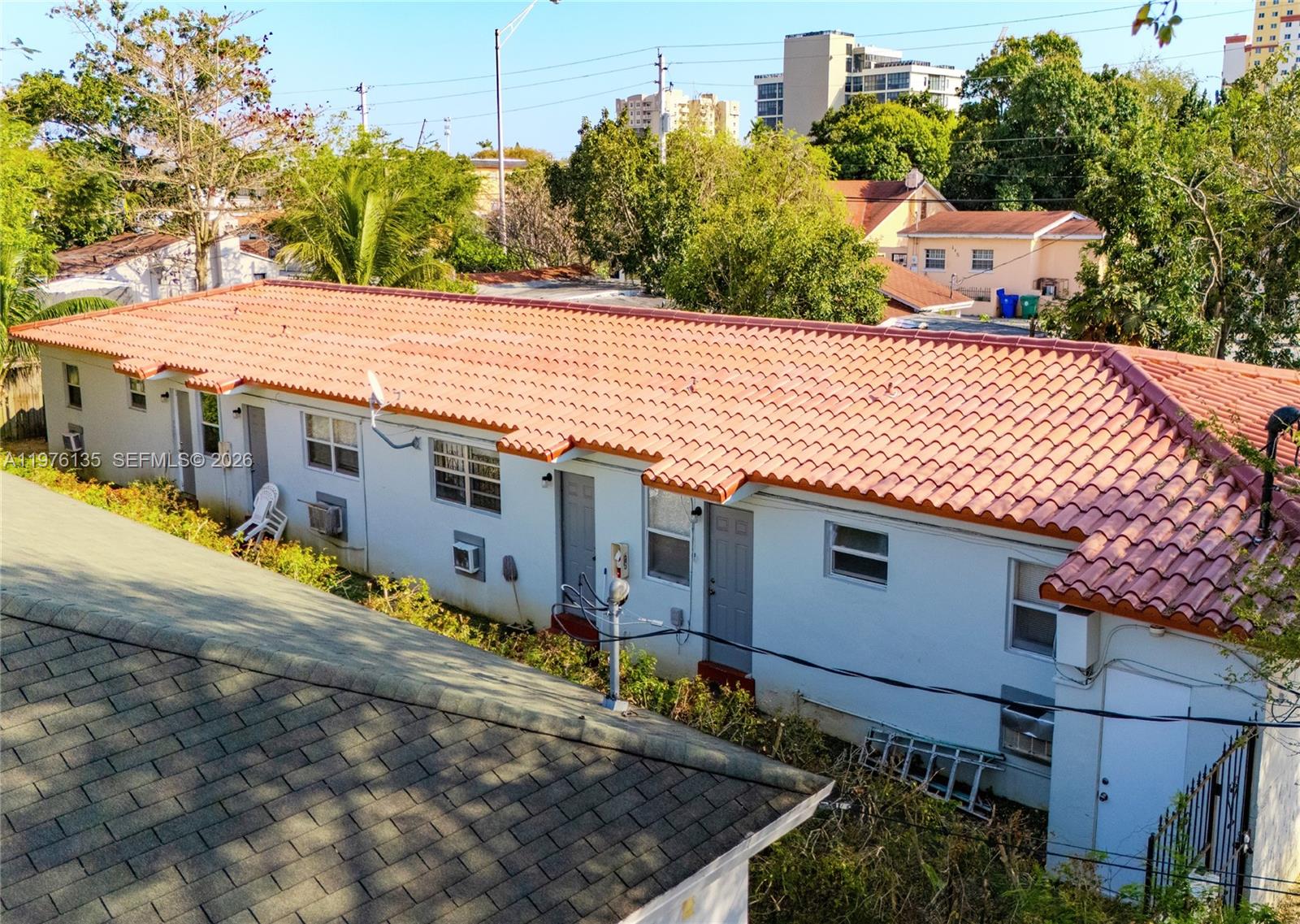 View photos, virtual tours, details... 8213 NE 1st Ave