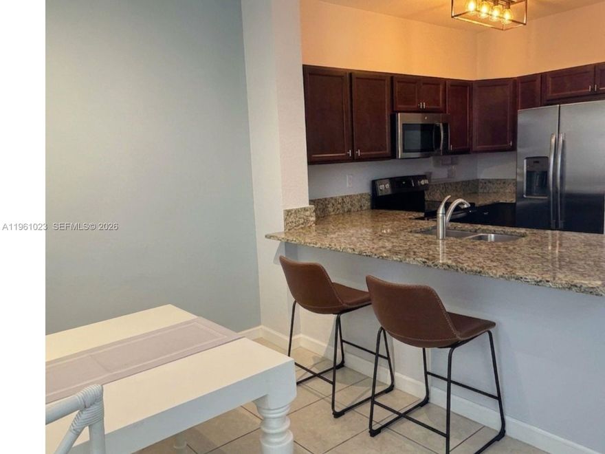 Strategic Opportunity in Isles at Oasis (Fiji)! Modern 3 bedroom, 2 bathroom unit offering the perfect balance of comfort and profitability in Homestead's fastest-growing area
Why this is the best decision:
 1. High-Value Location: Immediate connectivity to the Turnpike and US1. You are at the perfect midpoint between Downtown Miami and the Keys, just minutes from Baptist Hospital and Homestead's new commercial developments.
 2."Resort" Lifestyle: Exclusive access to the Isles at Oasis Clubhouse. Includes a lagoon-style pool, fully equipped gym, jacuzzi, and private security. Offers a luxury quality of life with a reasonable HOA.
 3. High-Demand Asset: At 1,151 sq. ft. (built in 2017), this unit exceeds the local average size. It is a highly sought-after product for both qualified tenants (high ROI) and families demanding space and modernity.
Excellent natural light. Sale includes all appliances: side-by-side refrigerator with water/ice dispenser, range, microwave, dishwasher, and washer/dryer. Also features a private external storage unit. Furniture is negotiable (not included in list price).