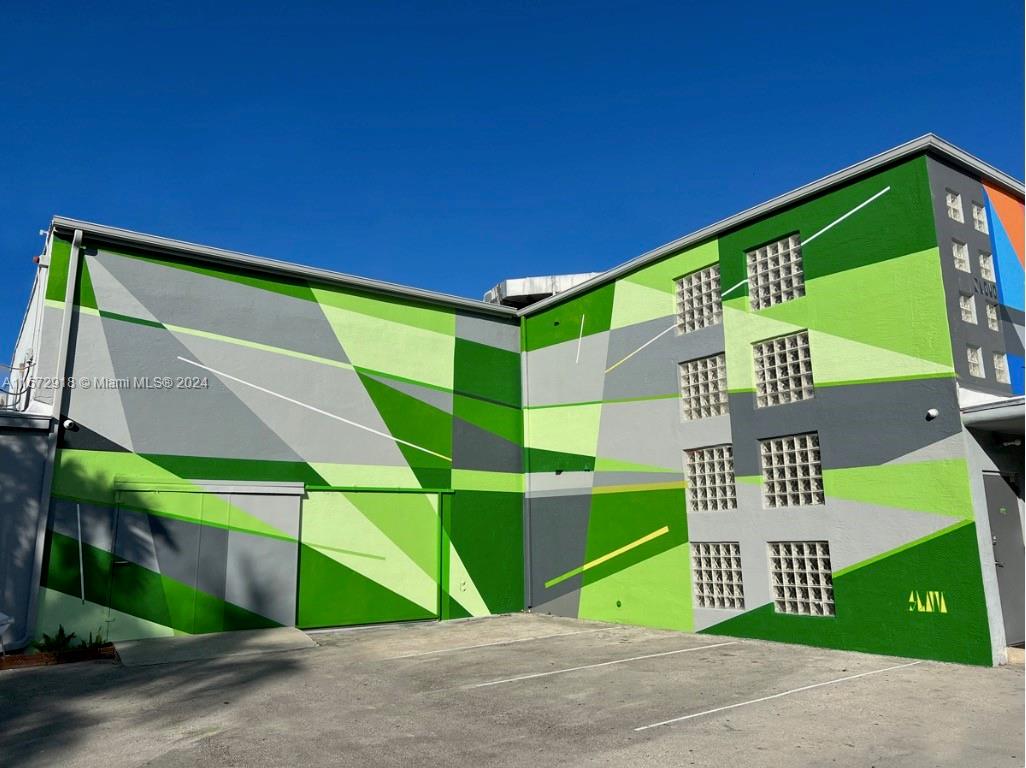 This 7,134-square-foot industrial flex space is located in the vibrant Silver Bluff neighborhood of Miami. Its versatile layout accommodates a variety of uses, including creative offices, light manufacturing, and retail showrooms. The property benefits from its strategic location near Coconut Grove, Brickell, and major transportation routes such as US-1 and I-95.