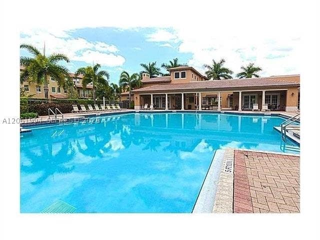 Photo of 14663 SW 9th St #1810, Pembroke Pines, FL 33027 (MLS # A12061994)