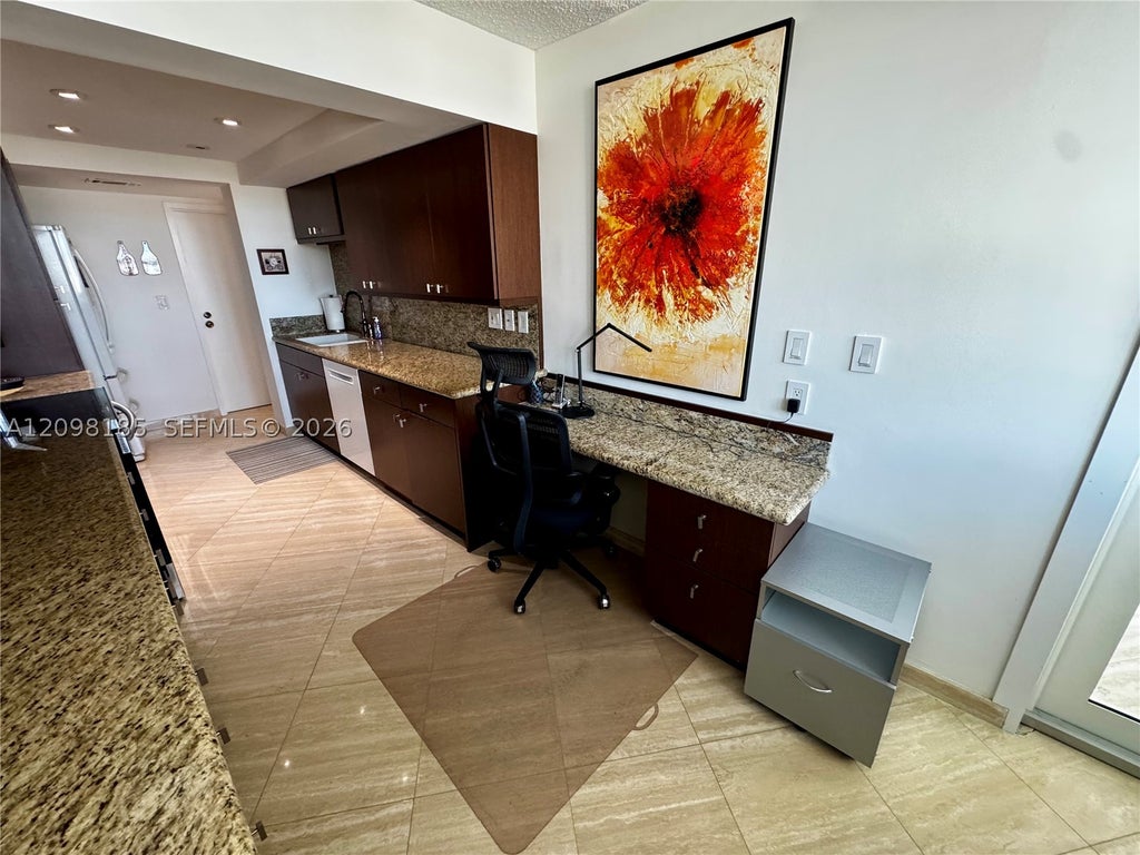 Photo of 100 Golden Isles Dr #1405, Hallandale Beach, FL 33009 (MLS # A12098185)