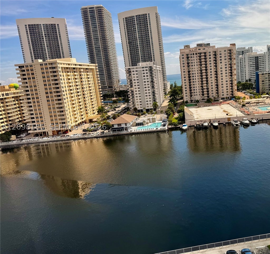 Photo of 100 Golden Isles Dr #1405, Hallandale Beach, FL 33009 (MLS # A12098185)