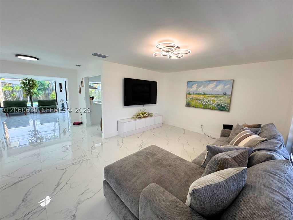 Photo of 8550 NW 26th St, Sunrise, FL 33322 (MLS # A12060620)