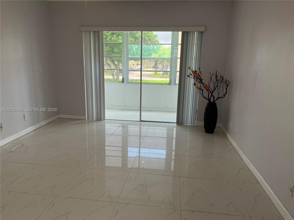 Photo of 200 Ashbury Rd #208, Hollywood, FL 33024 (MLS # A12010260)