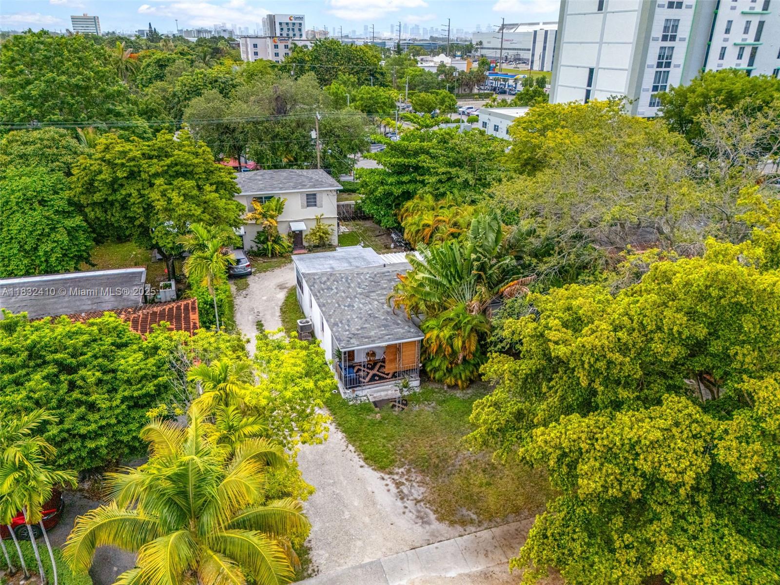 Excellent income opportunity! Duplex with three rented units — two 2BD/1BA units plus a separate efficiency. Currently generating $4,850/month ($58,200/year) with tenants in place. New roof (2021) and new A/C (2023) in the front unit. Property offers strong cash flow with room to add value through updates or rent increases. Ideal for investors seeking a steady return and long-term upside in a growing rental market. Not turnkey, but full of potential to maximize your investment.