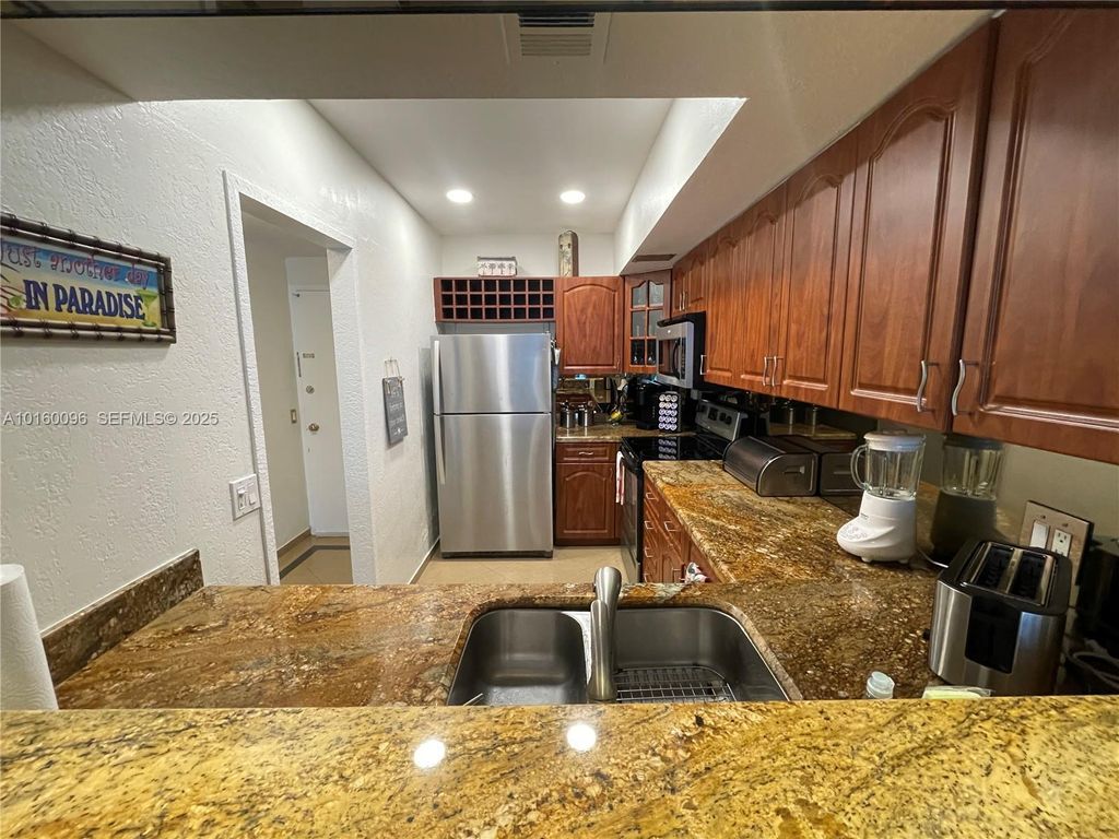 Photo of 3505 S Ocean Dr #105, Hollywood, FL 33019 (MLS # A10160096)