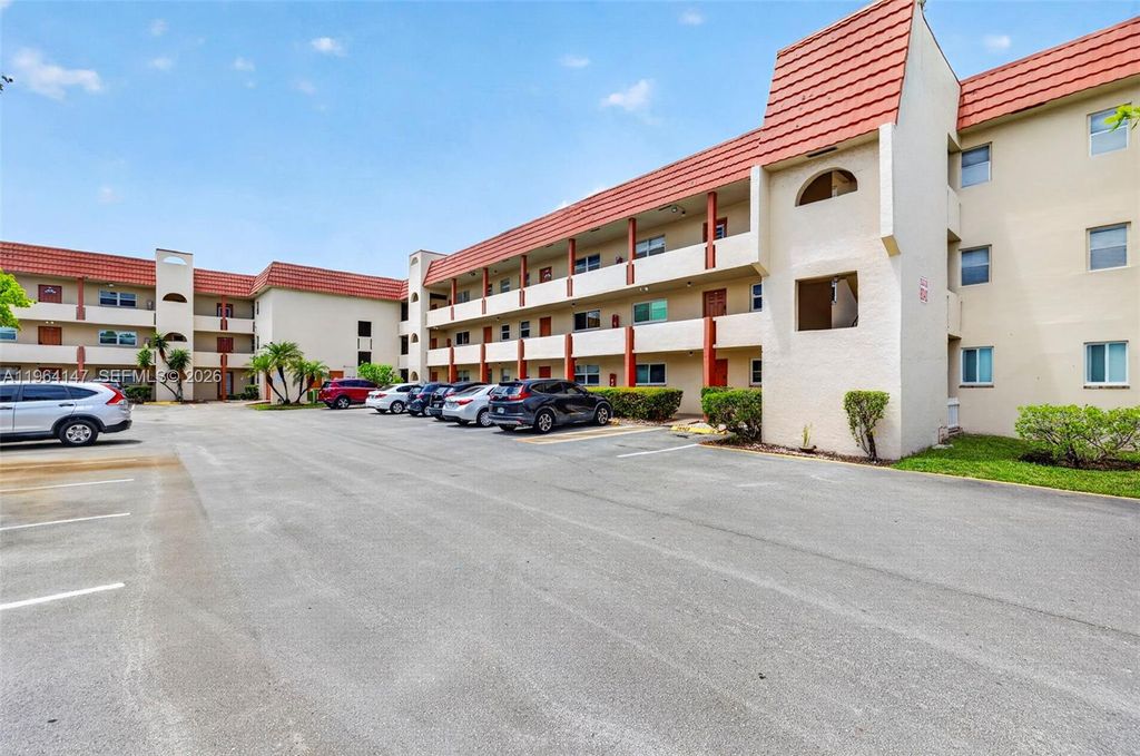 Photo of 8040 N Sunrise Lakes Dr #108, Sunrise, FL 33322 (MLS # A11964147)