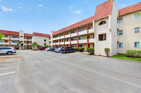 Photo of 8040 N Sunrise Lakes Dr #108, Sunrise, FL 33322 (MLS # A11964147)