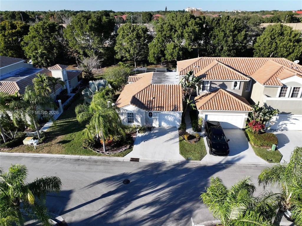 Photo of 11831 NW 57th St, Coral Springs, FL 33076 (MLS # A11961103)