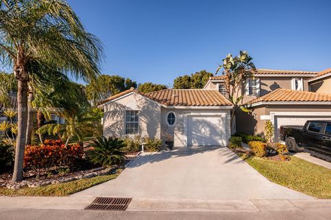 Photo of 11831 NW 57th St, Coral Springs, FL 33076 (MLS # A11961103)