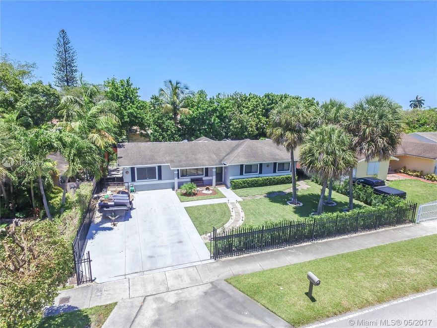 Charming, modern & Renovated home! Very spacious. In an established neighborhood. Back yard with space for a pool. Hurricane shutters on all windows. Property is fenced. Just bring your clothes & toothbrush!