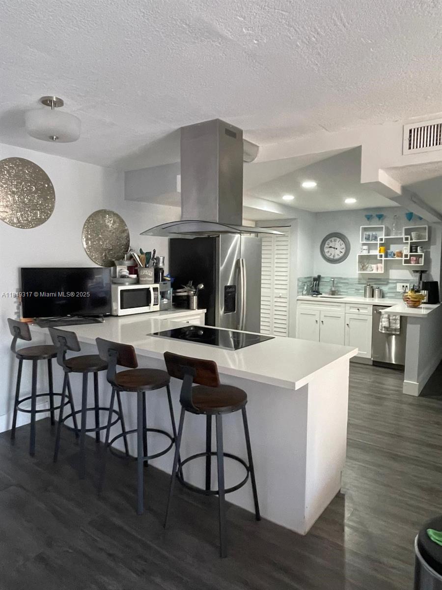 Welcome to your upgraded 3 bedroom, 2 bath condo in the heart of Kendall! This large and well upgraded unit, with washer and dryer in unit and dual balconies with pool view is ready for its new owner. BUY WITH 5% DOWN! BUILDING HAS RESERVES! Just minutes from major highways, shopping, top rated schools, public, charter and private, with water, roof, insurance, reserve fund and outdoor building maintenance included in your association payment. This property is fully gated with inside parking for additional safety.