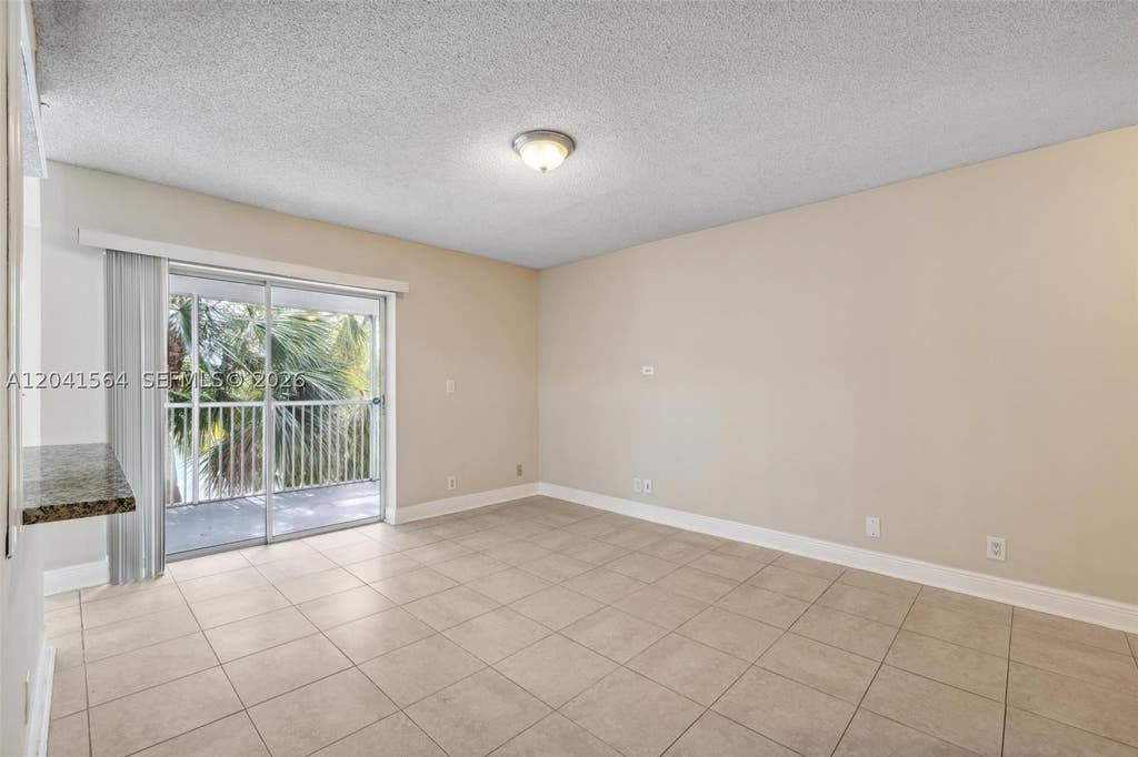 Photo of 5672 Rock Island Rd #254, Tamarac, FL 33319 (MLS # A12041564)