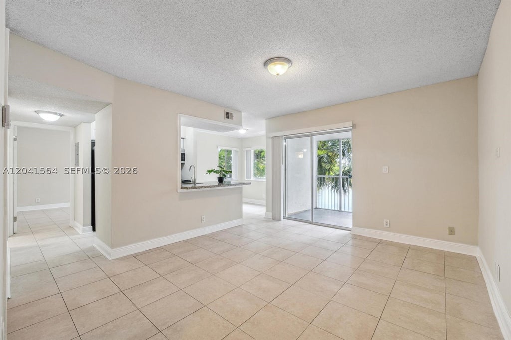 Photo of 5672 Rock Island Rd #254, Tamarac, FL 33319 (MLS # A12041564)