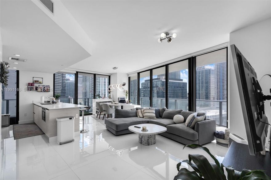 DUA Residence — Bright corner 2BR + den / 2BA (1,279 SF) with wrap-around balcony and open layout ideal for living and entertaining. Modern finishes, custom built in closets; Bosch Appliances,  in-unit laundry and oversized bedrooms flood the space with natural light. Live resort-style in Dua Miami (formerly SLS Brickell) with standout amenities: 200-ft heated pool with private cabanas and al-fresco dining, rooftop pool with skyline/water views, full-service spa, state-of-the-art fitness center, 24/7 concierge & security, valet/secured garage, screening room, kids’ room, party room, on-site dining by top chefs, 6,000-sf ballroom and 2,000-sf meeting space. Prime Brickell location — steps to dining, nightlife and transit.