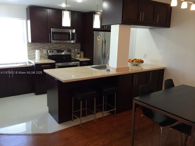 Beautiful, bright and spacious corner unit. 1 BEDROOM + DEN and 2 full Baths. 1300sq/ft. Hardwood floors, modern open design, stainless steel appliances, energy efficient A/C. Bright condo in quite building in pleasant Bay Harbor Islands. Spacious den/ guest room/ home office ideal to work from home. Plenty of closet space. Assigned parking. Swimming pool. Pets under 20 lbs OK. First, last and deposit to move in, good credit history. HOA approval required. Only 2 permanent residents.