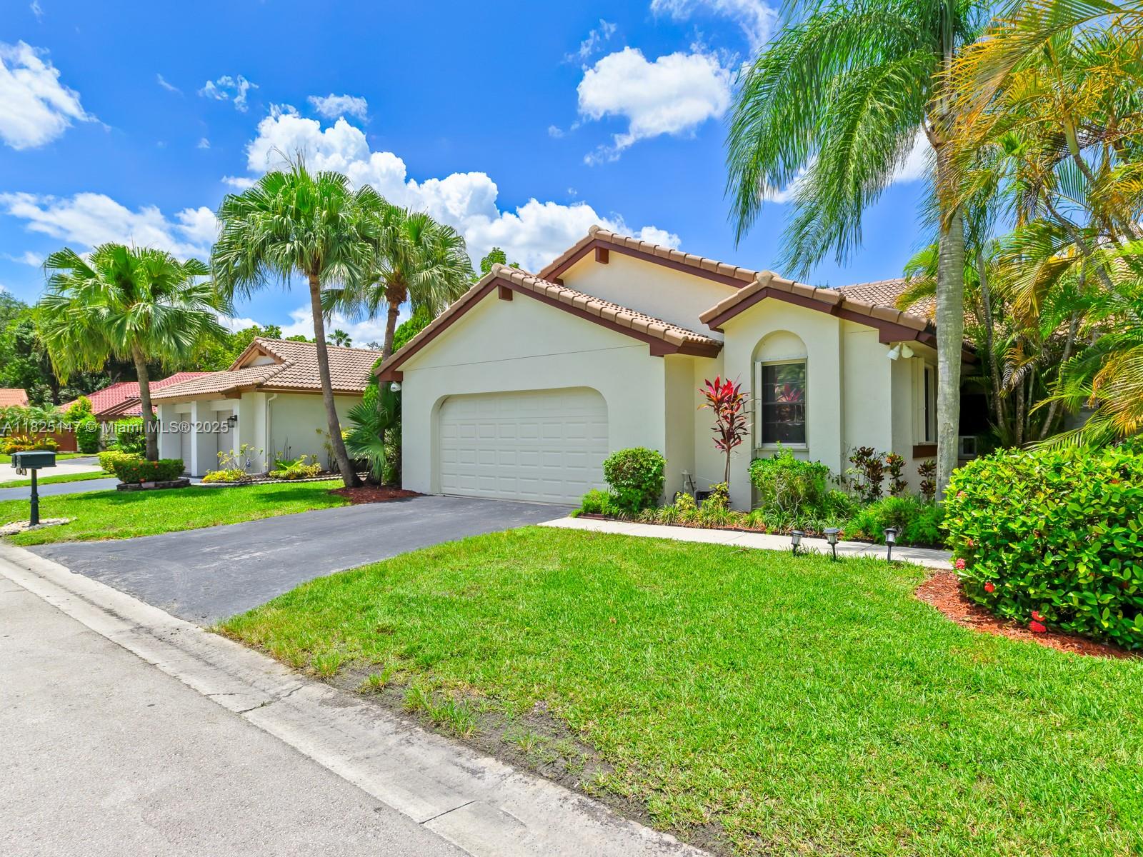Beautifully renovated home with attention to detail in the sought-after Heron Lakes community of Country Isles, Weston. This light-filled property features a remodeled kitchen and bathrooms, vaulted ceilings, and an open layout perfect for modern living. Recent updates include a 2023 A/C, 2025 water heater, full storm shutters, impact-rated garage door, and a fully fenced backyard ideal for entertaining or relaxing. Located near top-rated Weston schools, with low HOA fees and convenient access to I-75, parks, and shopping. A fantastic opportunity to enjoy comfort, safety, and value in one of Weston’s most desirable neighborhoods.