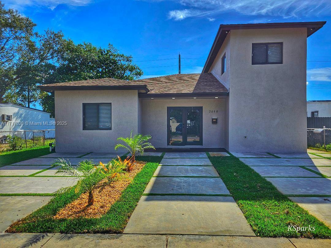 Price Reduction! Newly constructed 2056 ft. 3/3 downstairs and a separate 1/1 living space with kitchenette upstairs that can generate $1500 monthly rental income. Stainless steel appliances throughout, office, quartz countertops, and indoor laundry room with washer and dryer. Downstairs has two master bedrooms, the house is built with impact windows and doors.