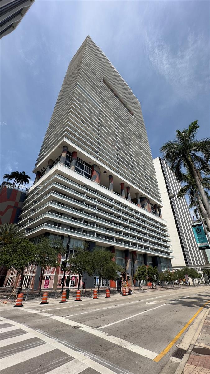 Experience high end living in this stunning 1-bedroom+den, 1-bath residence at 50 Biscayne in Downtown. This upscale, just fully remodeled unit features an expansive balcony with breathtaking views of Biscayne Bay and the Miami skyline. The kitchen is equipped with new appliances, European cabinetry, and a sleek quartz countertop. A full remodel has just been completed! 50 Biscayne is a pet-friendly building offering world-class amenities such as a resort style pool, a state-of-the-art gym, spa, sauna and steam room, yoga room, barbecue area, valet parking, and much more. Enjoy the best of Miami living, just steps from top restaurants, museums, South Beach, Brickell, Midtown, and Edgewater. All lights are adjustable, currently warm white. FULLY FUNDED RESERVES. Owner financing available.