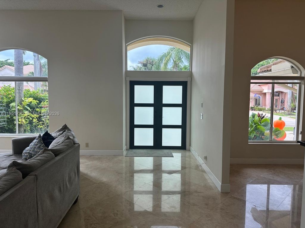 Photo of 19922 Dinner Key Dr, Boca Raton, FL 33498 (MLS # A11951730)