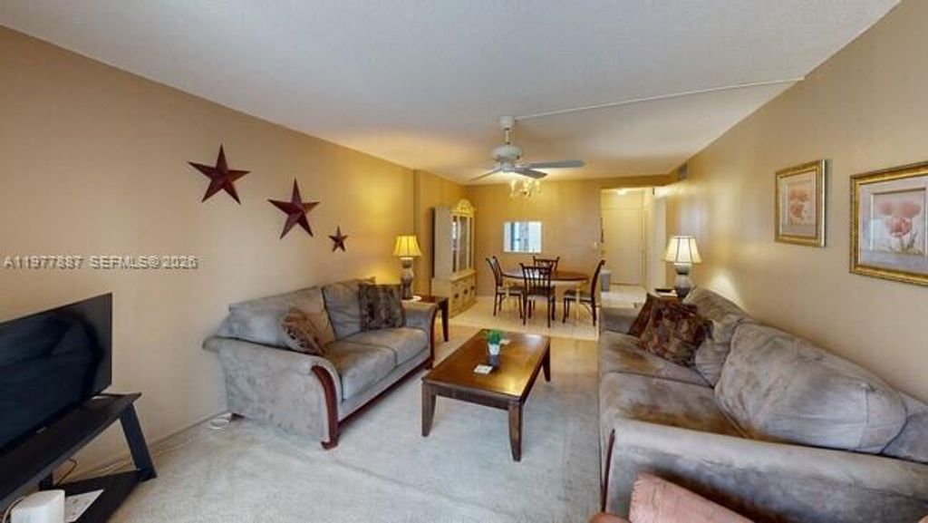 Photo of 619 NE 14th Ave #303, Hallandale Beach, FL 33009 (MLS # A11977887)