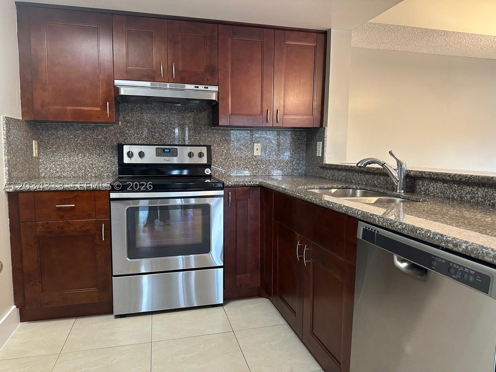 Photo of 9122 W Atlantic Blvd #724, Coral Springs, FL 33071 (MLS # A12034313)