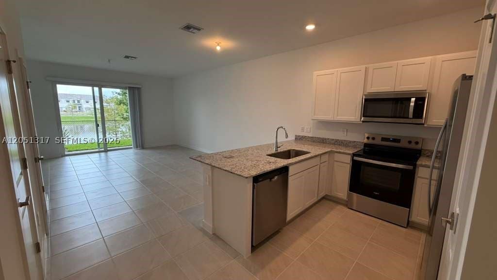 Photo of 149 Lakeside Landing Ct #0, Royal Palm Beach, FL 33411 (MLS # A12051317)