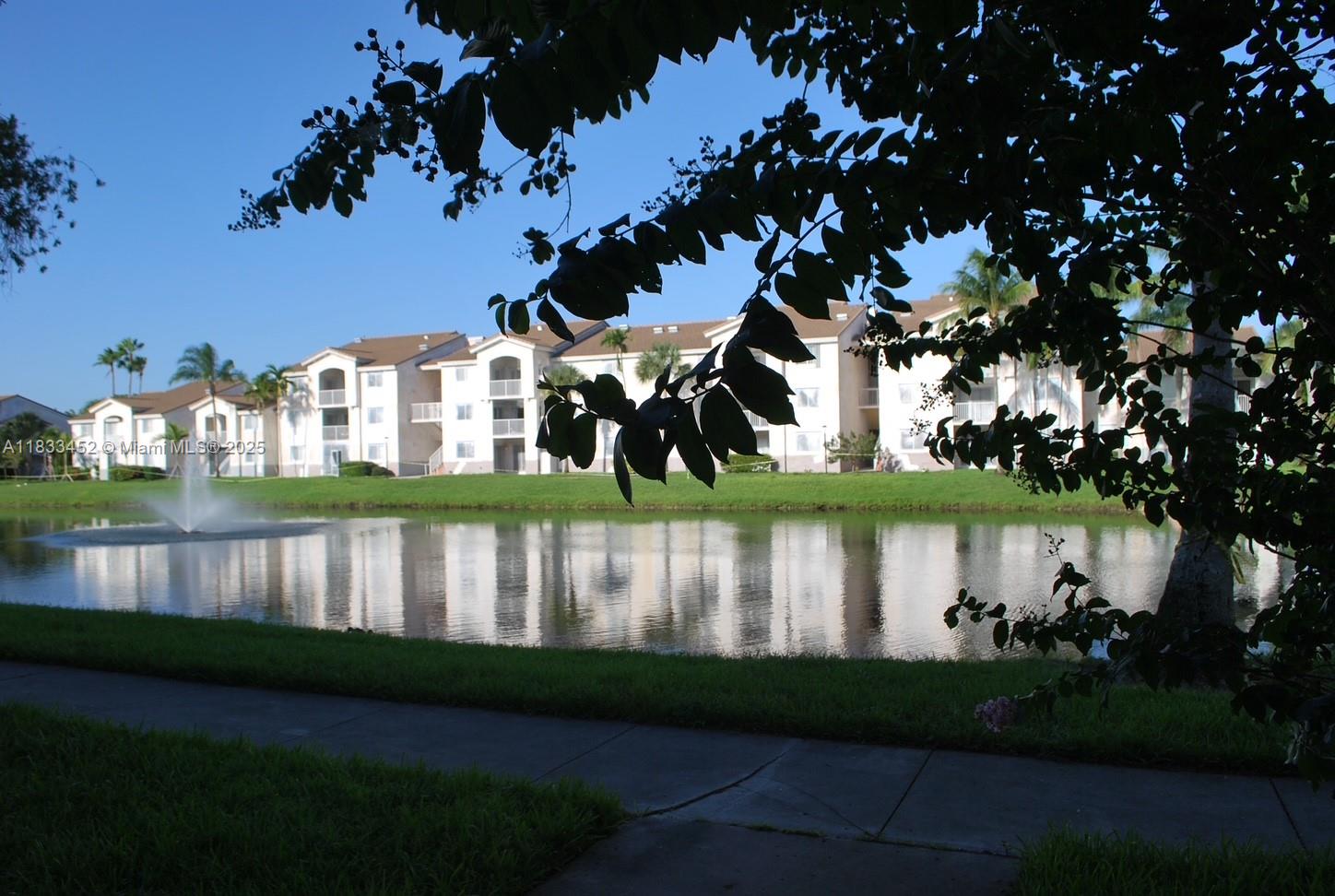 Step into this freshly painted, generously sized condo offering Modern tile flooring throughout, an in-unit washer & dryer, and a smart layout with his & hers closets, a makeup vanity, and a private patio with a beautiful lake view. Enjoy the convenience of assigned parking and stylish new modern zebra blinds.
Residents enjoy resort-style amenities including a pool, gym, racquetball courts, and a remodeled clubhouse. The exterior has been recently renovated, with the façade freshly painted for a clean, modern look.
Walking distance to NOVA University, Broward College (BCC), shops, restaurants, and a variety of local businesses. Only minutes from beaches, major highways, and Fort Lauderdale Airport.
This opportunity won’t last, schedule your showing today!