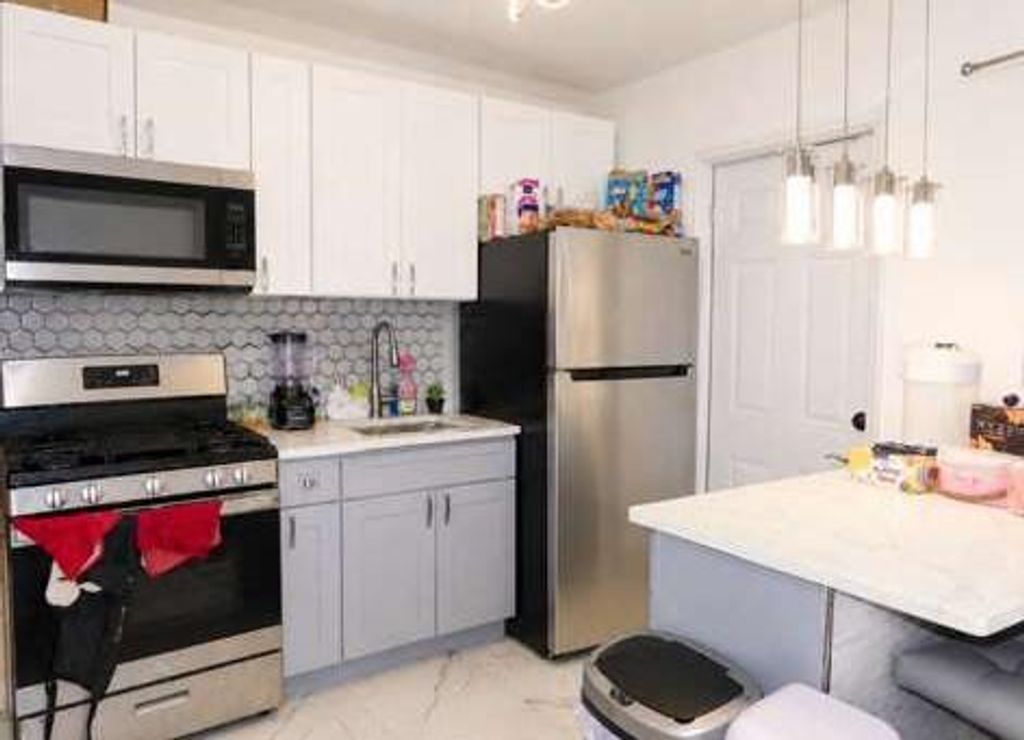 Photo of 306 NE 6th Street #1-4, Hallandale Beach, FL 33009 (MLS # B26038327)