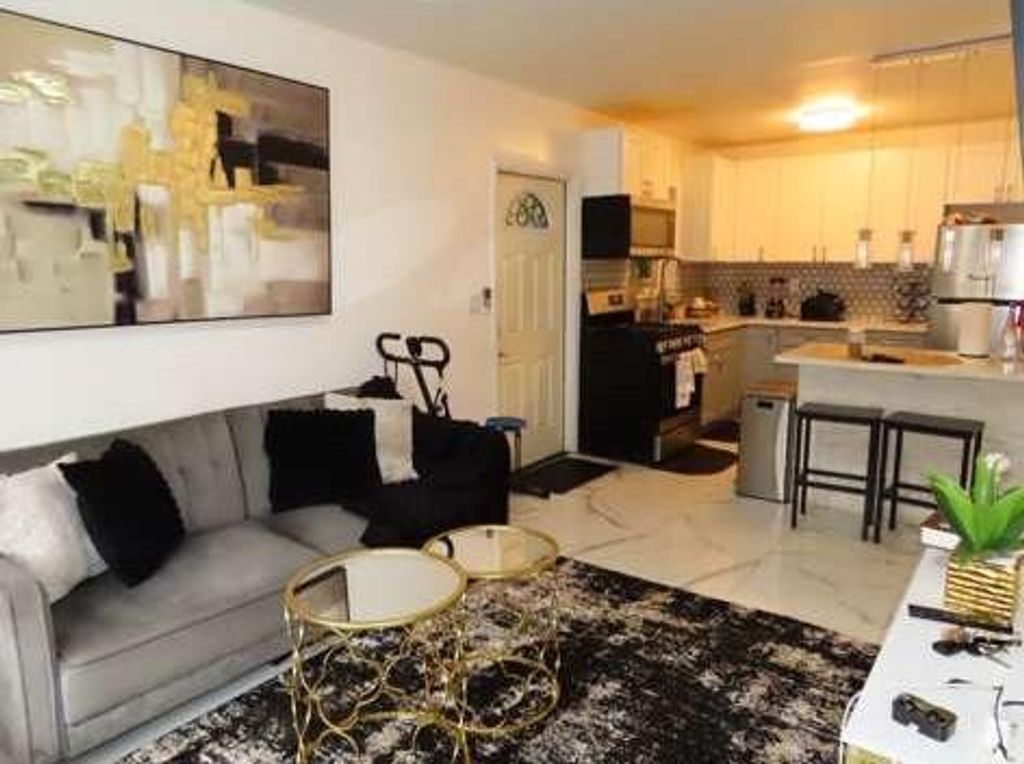Photo of 306 NE 6th Street #1-4, Hallandale Beach, FL 33009 (MLS # B26038327)