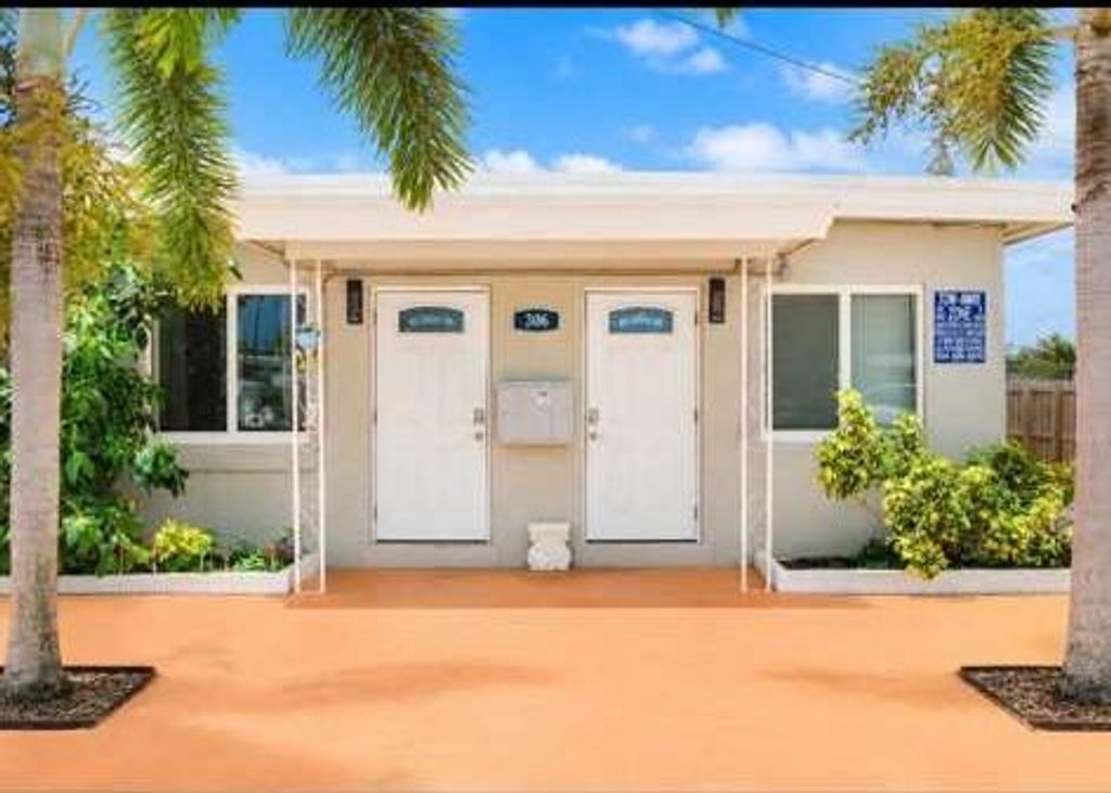 Photo of 306 NE 6th Street #1-4, Hallandale Beach, FL 33009 (MLS # B26038327)
