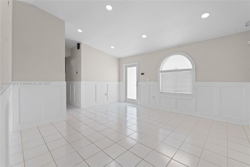 Spacious 4BD/2BA with a brand-new metal roof and impact windows, both installed March 2025. Enjoy plenty of space for outdoor entertaining and a large primary suite with a cozy sitting area. Ceramic tile flooring flows throughout, creating a clean and cohesive look. Garage has been converted to include an air-conditioned pantry/laundry room for added functionality. Features a state-of-the-art security system with cameras and intruder alert beams for peace of mind. New appliances and an assumable VA mortgage with a 4.99% interest rate make this home a rare opportunity. No HOA. **THIS HOME QUALIFIES FOR UP TO $15,000 IN LENDER CREDITS IF THE BUYER GETS APPROVED WITH OUR PREFERRED LENDER - SEE LISTING ATTACHMENTS.**