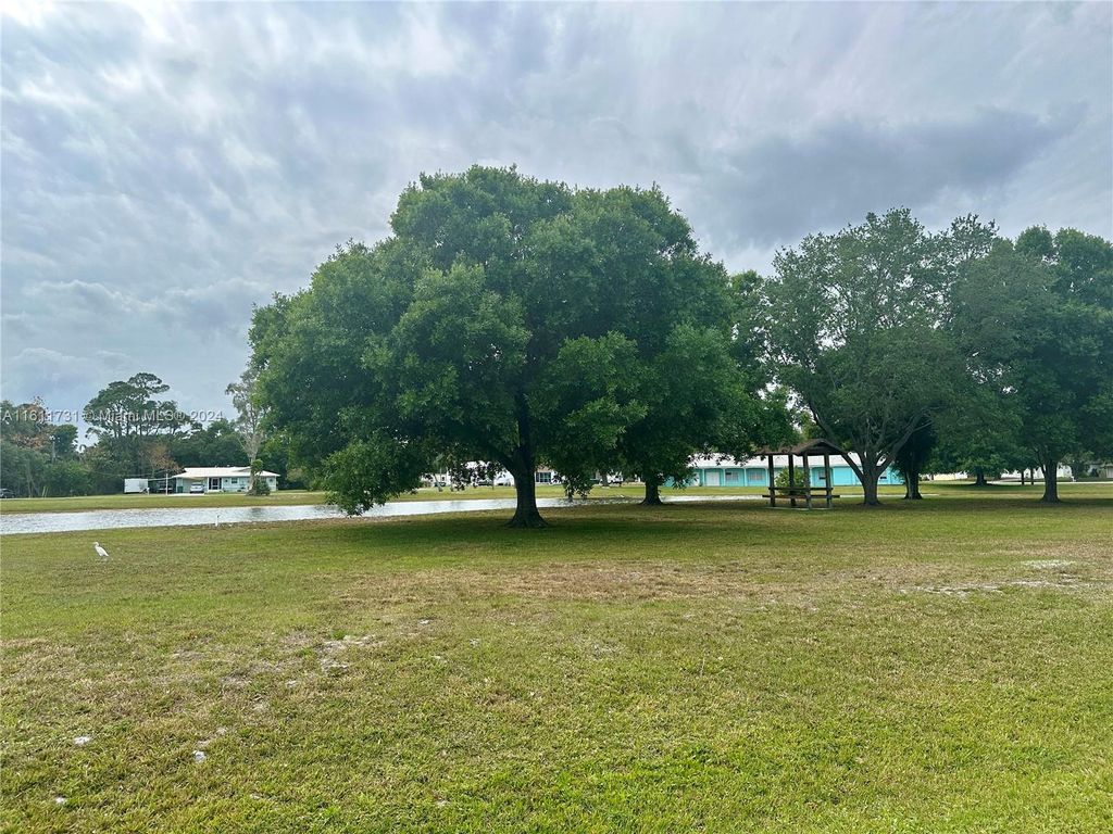 Photo of 4814 Lakewood Park Dr, Fort Pierce, FL 34951 (MLS # A11611731)