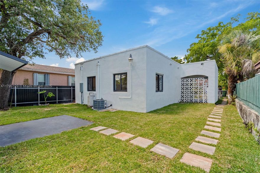Two CBS buildings on One Lot! Fully renovated TRIPLEX with strong income potential in turn-key condition. Front building features a spacious newly renovated 4BR/2BA house with carport. Rear building is a 2-story duplex with two updated units, each with full kitchens, private entry and laundry room. All units have been newly remodeled with new kitchens, baths, flooring, paint, and major system upgrades. Turnkey investment, ideal for owner-user or investor. Strong rental potential and low maintenance. Projected monthly income: $8,000/mo. Great location with easy access to Downtown, 15 Min drive to Miami Beach, plenty of shopping, and public/private schools. Don’t miss this move-in-ready asset with income-producing opportunity! Call to See!