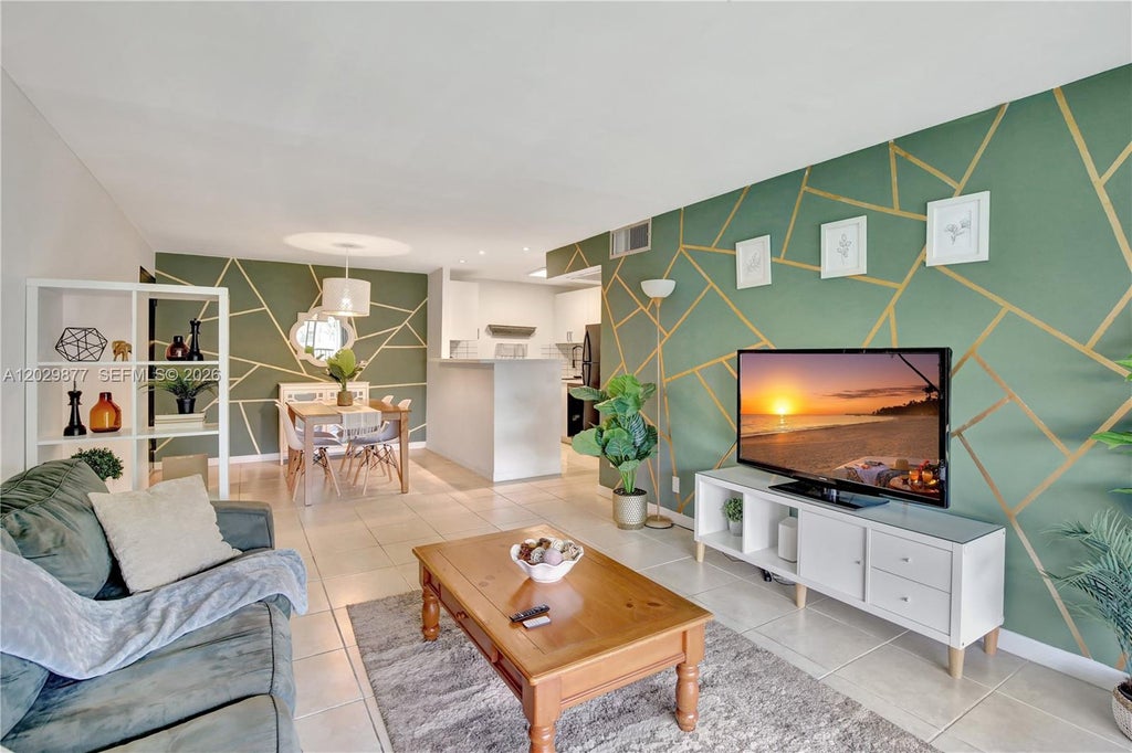 Photo of 5821 Washington St #30, Hollywood, FL 33023 (MLS # A12029877)