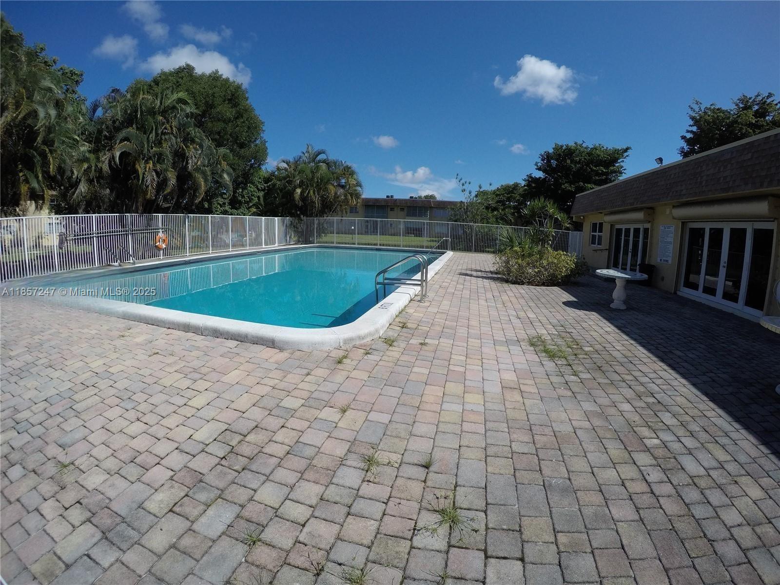 1-bedroom, 2-bathroom condo with a spectacular lake and pool view? Look no further than this beautiful property located at Oak Hills Condominium , in Dania, Fl. Enjoy the stunning Lake and pool views from your screened in balcony, or come inside and relax in the newly updated apartment with modern appliances, sleek cabinets, and stunning porcelain floors, providing the perfect space to entertain or relax. The bathrooms have new fixtures, pristine tile work, and ample storage. Prime location just minutes from the beach and schools. Short walking distance to houses of worship. Next to shopping, dining, and entertainment. Hardrock guitar hotel just minutes away! Plus, with a price that won't break the bank! Don't miss out on the chance to make it your new home