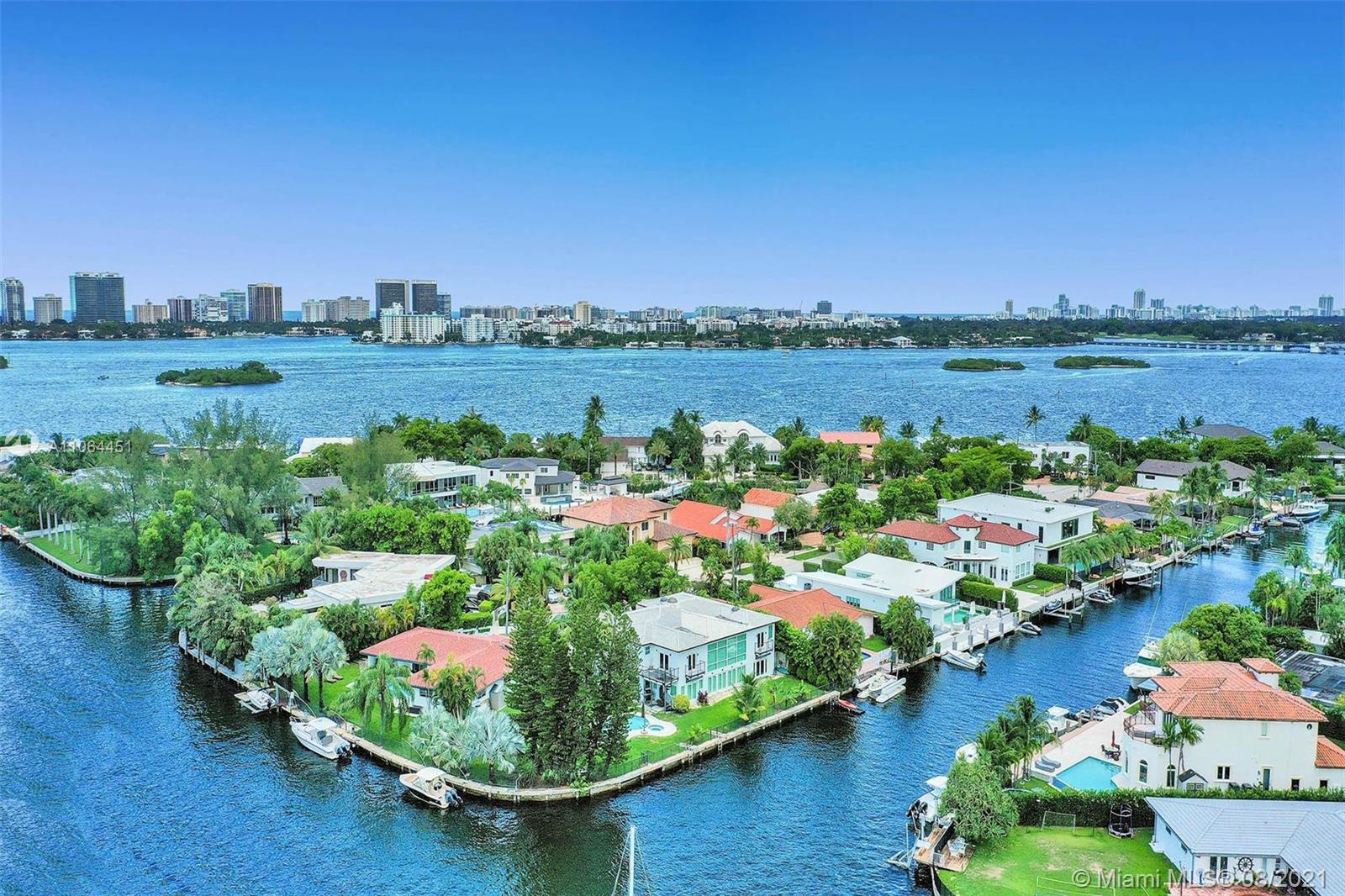 Newly remodeled 2-story waterfront home in the exclusive gated community of Keystone Point on Island 5. This home has been completely updated and features 8 beds plus office, 6 baths, 2 car garage, with 180-foot seawall that can accommodate multiple boats or large vessels, oversized lot 12,207 SF. Open floor plan with plenty of natural light & amazing sunset views. Large master bdrm w/ a huge walk-in closet, separate exercise room that could be used as an office, and a spacious en-suite bathroom w sauna. 4 beds upstairs with large living space. Huge kitchen with Subzero & Wolf Appliances. Laundry rooms on both floors, impact windows. Spacious backyard w/ pool. Great location - no fixed bridges & within minutes to great restaurants, grocery stores, Bal Harbor Shops, the beach, and more!