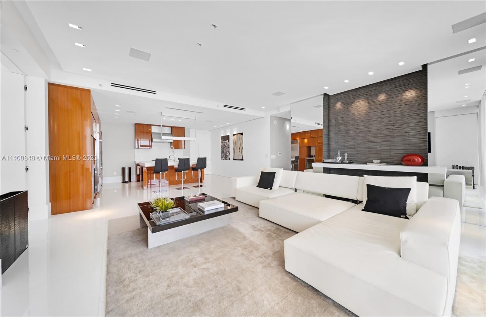 Discover the epitome of sophisticated living in this stunning 2BR corner residence, proudly positioned on the 14th floor of the acclaimed St. Regis, Bal Harbour. This turnkey unit showcases an exquisite attention to detail, boasting upscale B&B Italia & Minotti furnishings that seamlessly harmonize with its finely crafted interior. Marvel at the meticulous wood wall panelling and luxurious wallpaper that grace every room, enriched by a state-of-the-art drop ceiling with a superior lighting package, setting an alluring, ambient tone. As a part of the prestigious St. Regis, you'll gain access to its unrivaled 5-star amenities, including private beach access, unparalleled dining experiences, and the coveted proximity to the renowned Bal Harbour Shops.